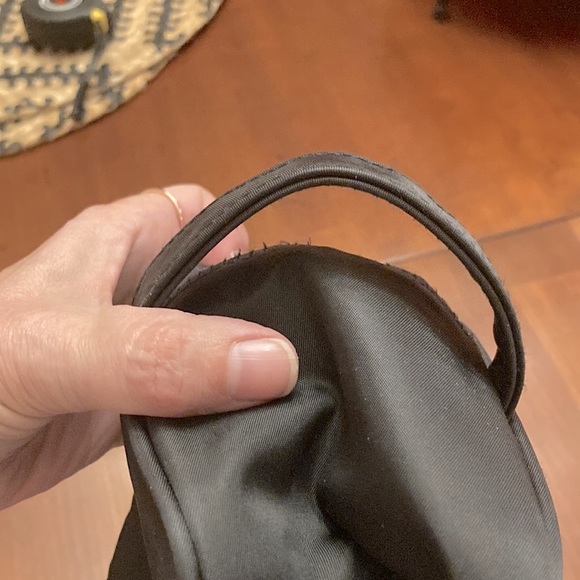 CHANEL TOILETRIES BAG. BLACK. CHANEL PRINTED IN RAISED LETTERS. HAS HANDLE. EUC - Picture 4 of 10